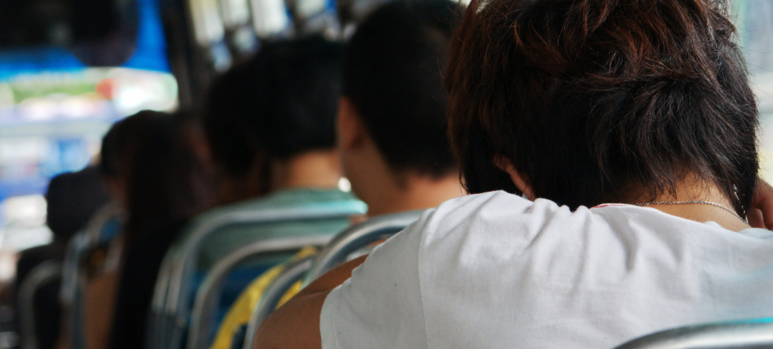 riders on city bus