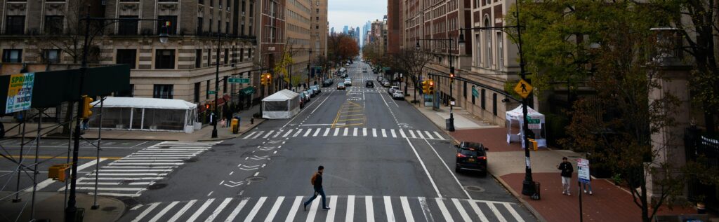 road diet blog header - new york street with center turn , bike lane, and parking