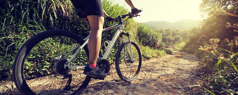 woman mountain biker on Virginia park trail